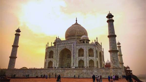 The Taj Mahal bathed in the soft light of sunrise.
