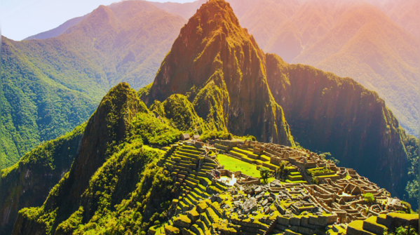 The ancient city of Machu Picchu nestled among the Andes Mountains in Peru.