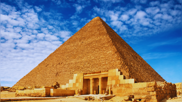 The majestic Pyramids of Giza standing tall against the Egyptian desert sky.