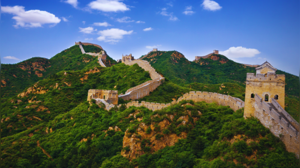A section of the Great Wall snaking across a mountain range in China.