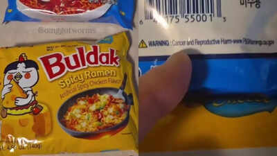 Close-up of instant ramen packaging with a cancer warning label