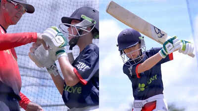 Fletcher Ponting displaying his batting skills under the guidance of his father, Ricky Ponting