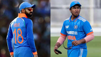 Virat Kohli and Vaibhav Suryavanshi pose in their jerseys