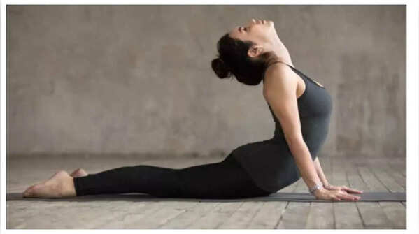 Cobra Pose for improving digestion and reducing belly fat.