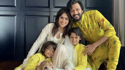 Riteish Deshmukh with his sons, Riaan and Rahyl, photographed by paparazzi.