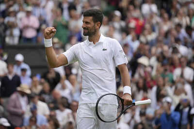 Djokovic celebrates his victory over de Minaur at Wimbledon