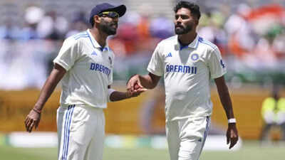 Bumrah and Siraj in discussion during the Test match